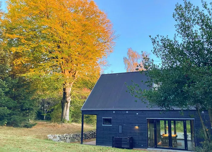 Ferienhaus Architect-designed Retreat In Private Woods Give